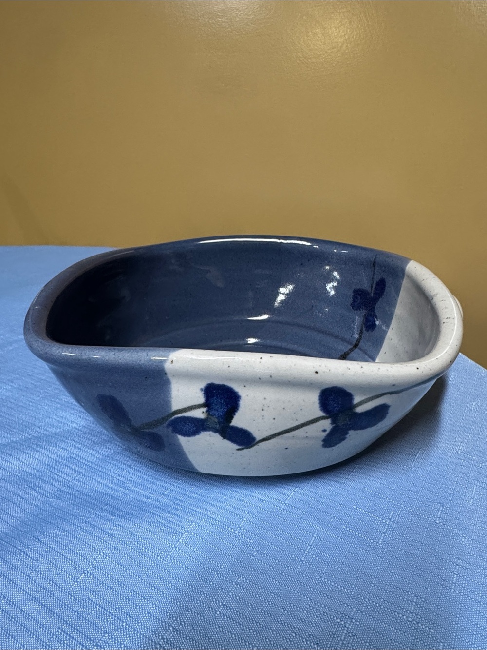 Follette Pottery handled bowl cream blue and signed 8” squarish